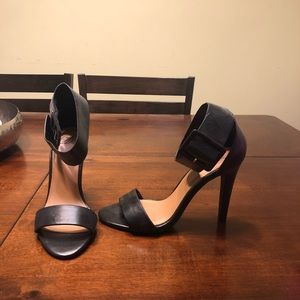 Black buckle ankle heels
